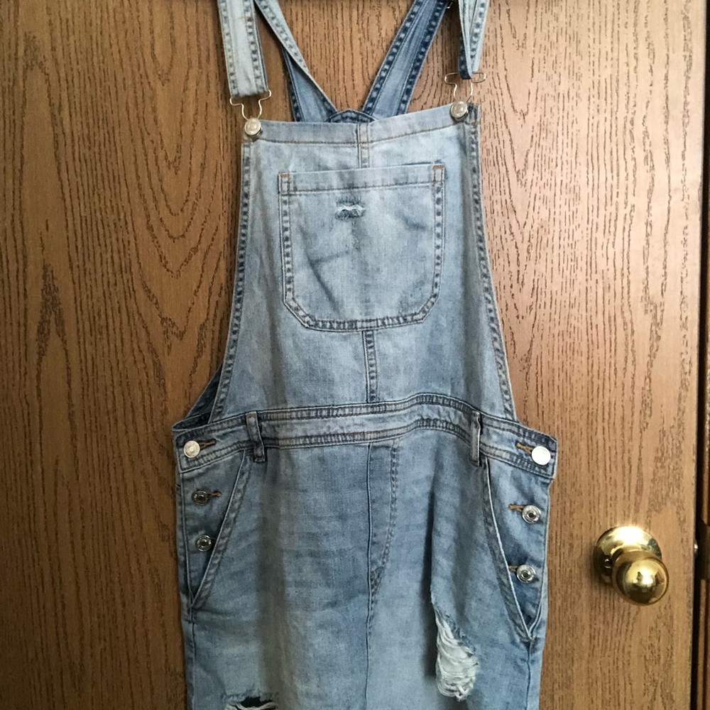 destroyed denim overalls